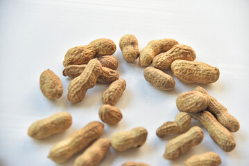 Peanuts in a shell on a white background