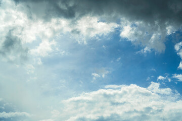 Naklejka na ściany i meble Sky background with heap clouds. Panorama