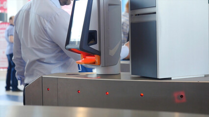 Entrance with e-pass. Media. Automatic checkpoint with contactless access. Turnstile with card...