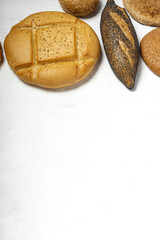 Background of assorted breads from above. Bakery food. Healthy food concept. flat lay