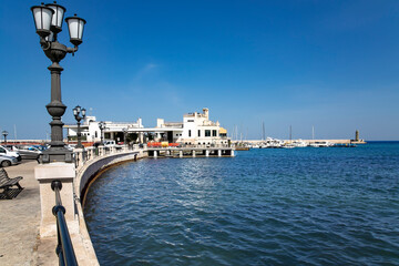 The promenade with a pier in Bari is distinguished by beautiful street lamps. Bari, Puglia, Italy....