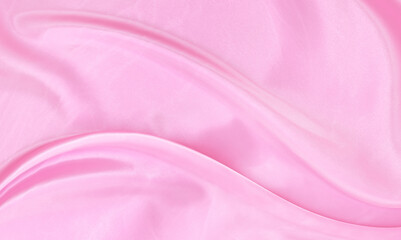 White pink satin texture that is gray silver fabric silk background with beautiful soft blur pattern natural.