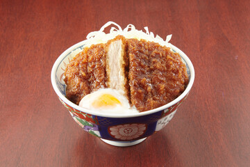 katsu don sauce served in a dish isolated on wooden table side view of singapore food