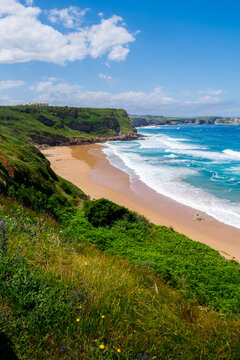 Beatiful ocean coast in summer day. Spain, suburb of Suances, summer day in the Province of Cantabria, it is photographed from Playa de Los Locos