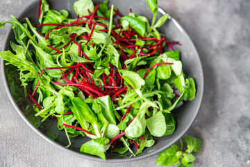 beet salad green leaves mix beetroot, mache leaves, cress fresh healthy meal food snack diet on the...