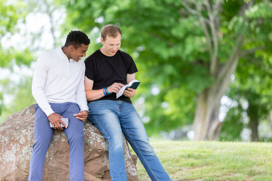 Guys studying the Bible together
