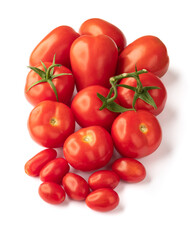 A group of assorted tomatoes isolated over white background