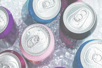 Group of aluminium cans in ice, cold drink.