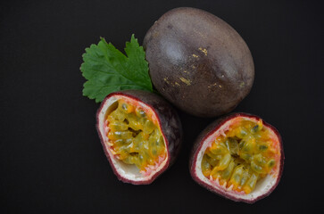 fresh passion fruit on a dark background,