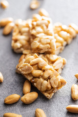 Sweet peanut bars on kitchen table.