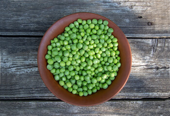 fresh green peas in a beautiful china plate
