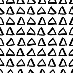 Small black ink contour linear triangles isolated on white background. Monochrome geometric seamless pattern. Vector simple flat graphic hand drawn illustration. Texture.