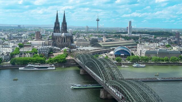 Time lapse shot of Cologne skyline and Cathedral with the Muscical Dome and the Hohenzollern Bridge on a summer day in Cologne, Germany