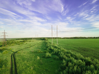 Transmission tower, power tower or electricity pylon, rural infrastructure. High-voltage powerline...