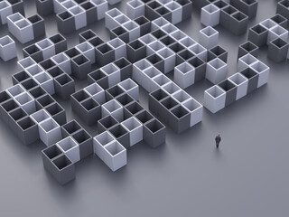 man in front of a maze of blocks