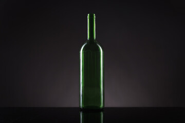Fototapeta na wymiar reflection of wine bottle and glass
