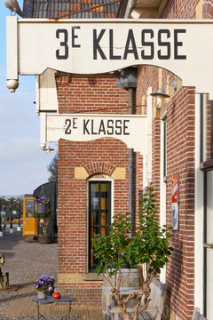 Third And Second Class Signs In Dutch Language On An Old Train Station Platform