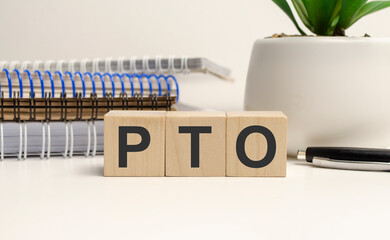 word pto with wood building blocks. Concept