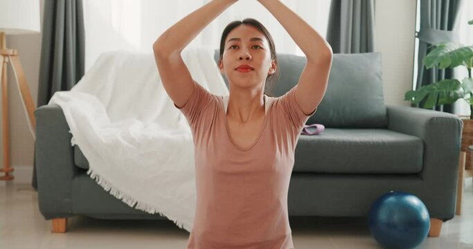 Young attractive strong beautiful fitness girl Asia woman in sportswear practice doing workout for beginner in living room at house. Home quarantine fitness training exercise without the gym.