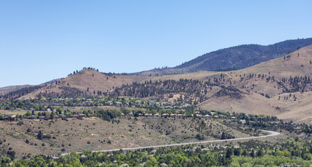 Residential Homes on top of a hill. Modern City. Sunny Spring Day in desert. Reno, Nevada, USA.