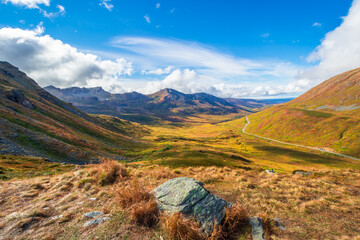 Hatcher Pass scenic drive in Talkeetna Mountains, Alaska in fall season.	 - obrazy, fototapety, plakaty