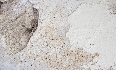 old and destroyed concrete wall with paint peeling off texture