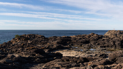 Fototapeta na wymiar Rock formation on the ocean shore.