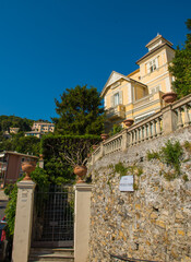 Fototapeta na wymiar Beautiful house on the hill overlooking the port of Genoa.