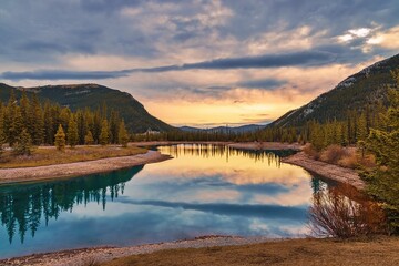 Sunrise Sky Reflecting On A Mountain Park Lake
