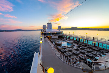 Deck view of the upper level and pool area of the Azamara Quest cruise ship at sunset on the Mediterranean Sea near Saint-Tropez, France on June 1 2022. © Kirk Fisher