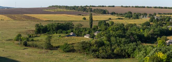 Landscapes of the Northern regions of Moldova. A pastoral panorama with nature. Moldovan villages...