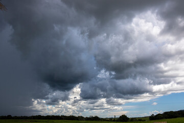Obraz na płótnie Canvas blue sky and rain storm clouds in Brazil