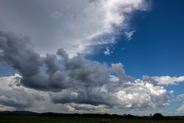 Obraz na płótnie Canvas blue sky and rain storm clouds in Brazil