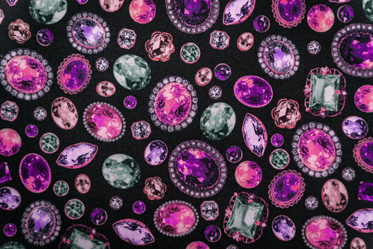 Pink jewel pattern print on a black textile fabric bg, diamonds and rubies