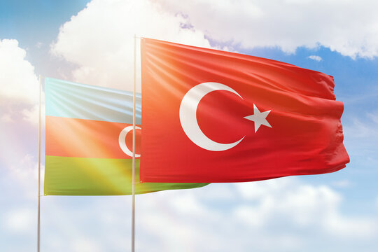 Sunny Blue Sky And Flags Of Turkey And Azerbaijan