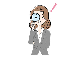 虫眼鏡をのぞくスーツ姿の女性