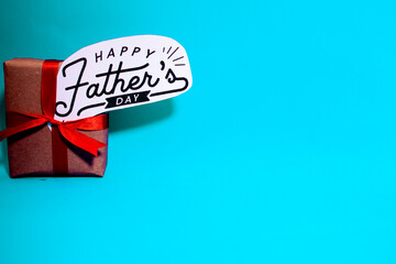 blue background with gift box happy father's day