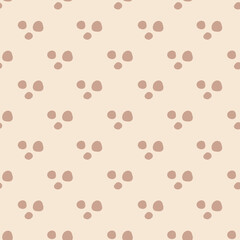Seamless background dotted gender neutral baby pattern. Simple whimsical minimal earthy 2 tone color. Kids nursery wallpaper or boho spotted fashion all over print.