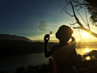 children playing with the morning sun