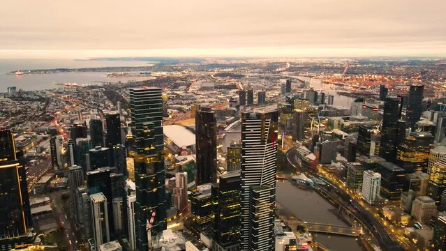 Aerial drone view of Melbourne City, Victoria, Australia looking over Yarra River in the early morning 