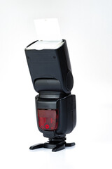 camera flash speedlight isolated on white background front view