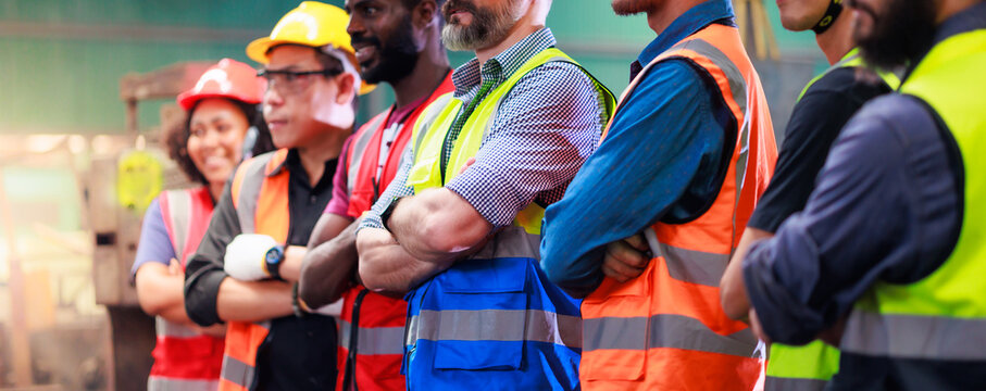 Arms Crossed. Professional Team Working At Workplace. Unity And Teamwork Concept. Portrait Engineer Factory Manager Worker And Mechanic Team Together In Factory Workplace