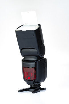 camera flash speedlight isolated on white background front view