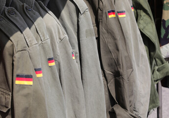 Green Military jackets of the German army uniform with the flag