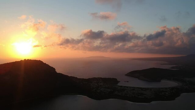 Panoramic aerial view of voidokilia beach, one of the best beaches in Europe. Beautiful lagoon of Voidokilia from a high point of view at sunset in Messinia, Greece, Europe