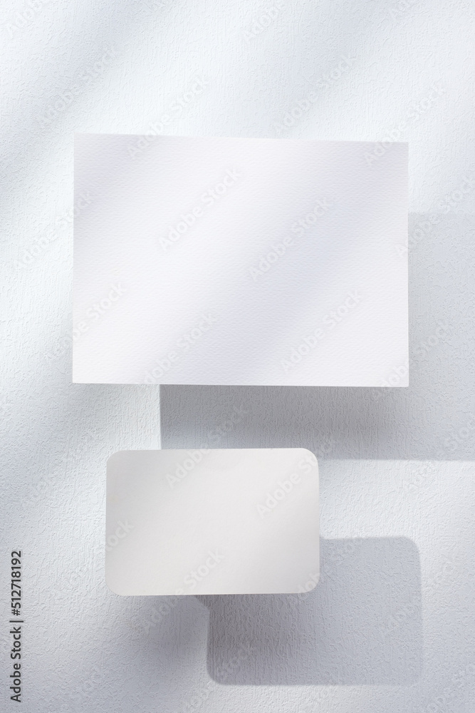 Poster blank poster card with product display stand with sunlight in white studio