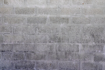 old ancient grey cinder block gray wall facade building background