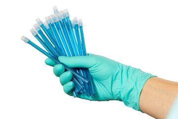 Dentist's hand in glove with saliva ejectors.
