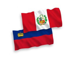 Fototapeta premium National vector fabric wave flags of Liechtenstein and Peru isolated on white background. 1 to 2 proportion.