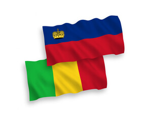 National vector fabric wave flags of Liechtenstein and Mali isolated on white background. 1 to 2 proportion.